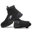 Load image into Gallery viewer, Black high top Commando shoe resting heel on tipped over shoe 800 x 800